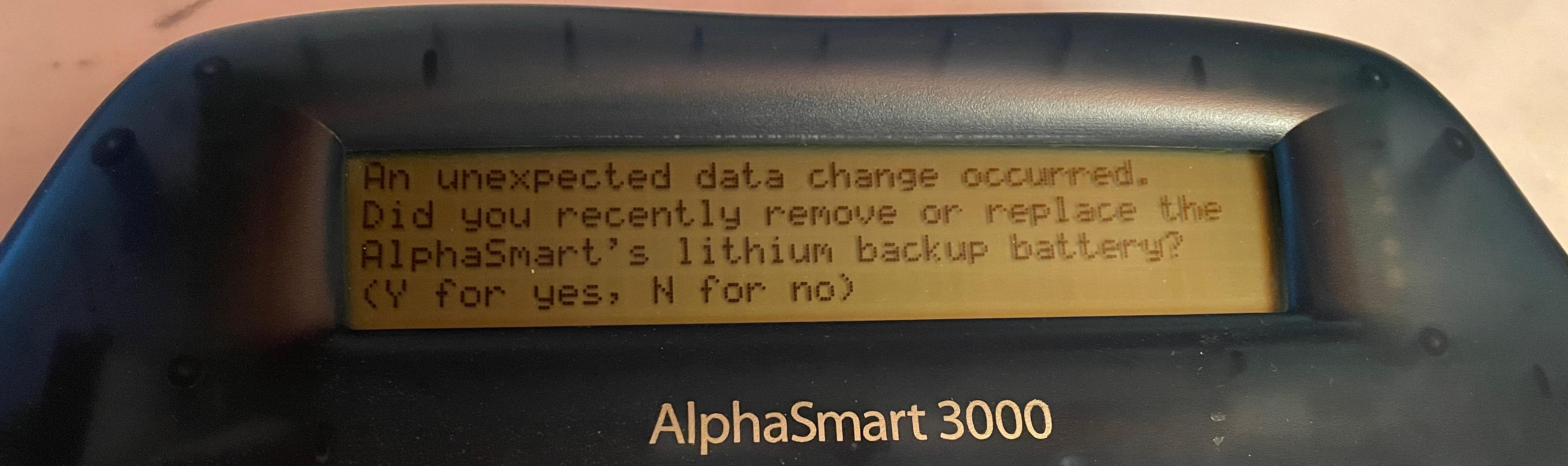 An unexpected data change occurred. Did you recently remove or replace the AlphaSmart's lithium backup battery? (Y for yes, N for no)